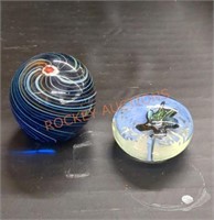 Spherical glass paperweights