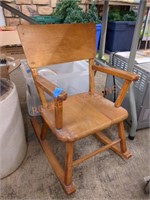 Vintage child's wooden rocking chair