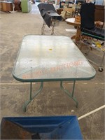 Approximately 5 ft x 3 ft glass top patio table