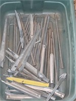 Tub of metal stakes