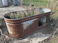Vintage water tank planter