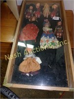 case w/ vintage dolls