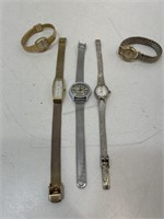5 assorted watches.