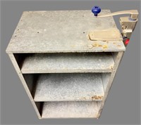 Edlund can opener on galvanized shelf