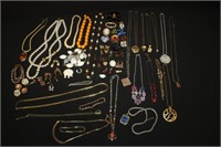 Bag of Costume Jewelry; pins, chains, pendants,