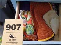 Two drawers: hot pads, dish towels, kitchen linen
