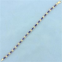 8.5ct TW Tanzanite Flower Design Line Bracelet in