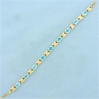 14ct TW Swiss Blue Topaz and Diamond Line Bracelet