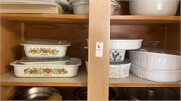 Shelf lot of Corningware, casserole, dishes