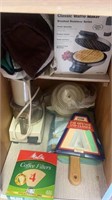 Cabinet lot of kitchen items waffle maker etc