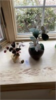 Faux plants- both metal, 1 in pottery, 1 in stone