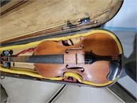 Antique fiddle with bow and case