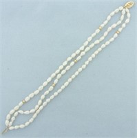 Triple Strand Baroque Pearl and Gold Bead Bracelet