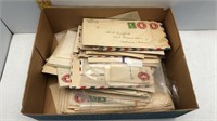 BOX FULL OF 1930s-1950s STAMPED ENVELOPES