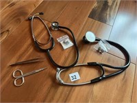 TWO DR. STETHOSCOPES AND TOOLS
