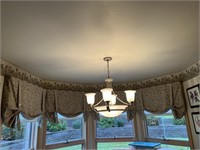 DRAPE SWAGS OVER THE DINING AREA WINDOWS W/