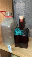 Old Cabin Whiskey bottle and glass milk bottle
