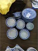 Porcelain small bowls and saucers