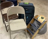 Suitcase, folding chairs, shelf and sleeping bag