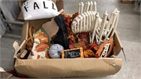 Large box of Halloween and fall decor