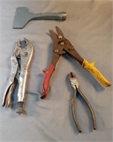 Lot of vise grips, scrapers, snips and cable