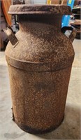Rusty antique milk can 23.5" tall