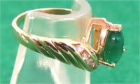 14K Gold Ring with Emerald and Diamonds.