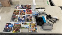 Wii with controllers joy stick and 14 games