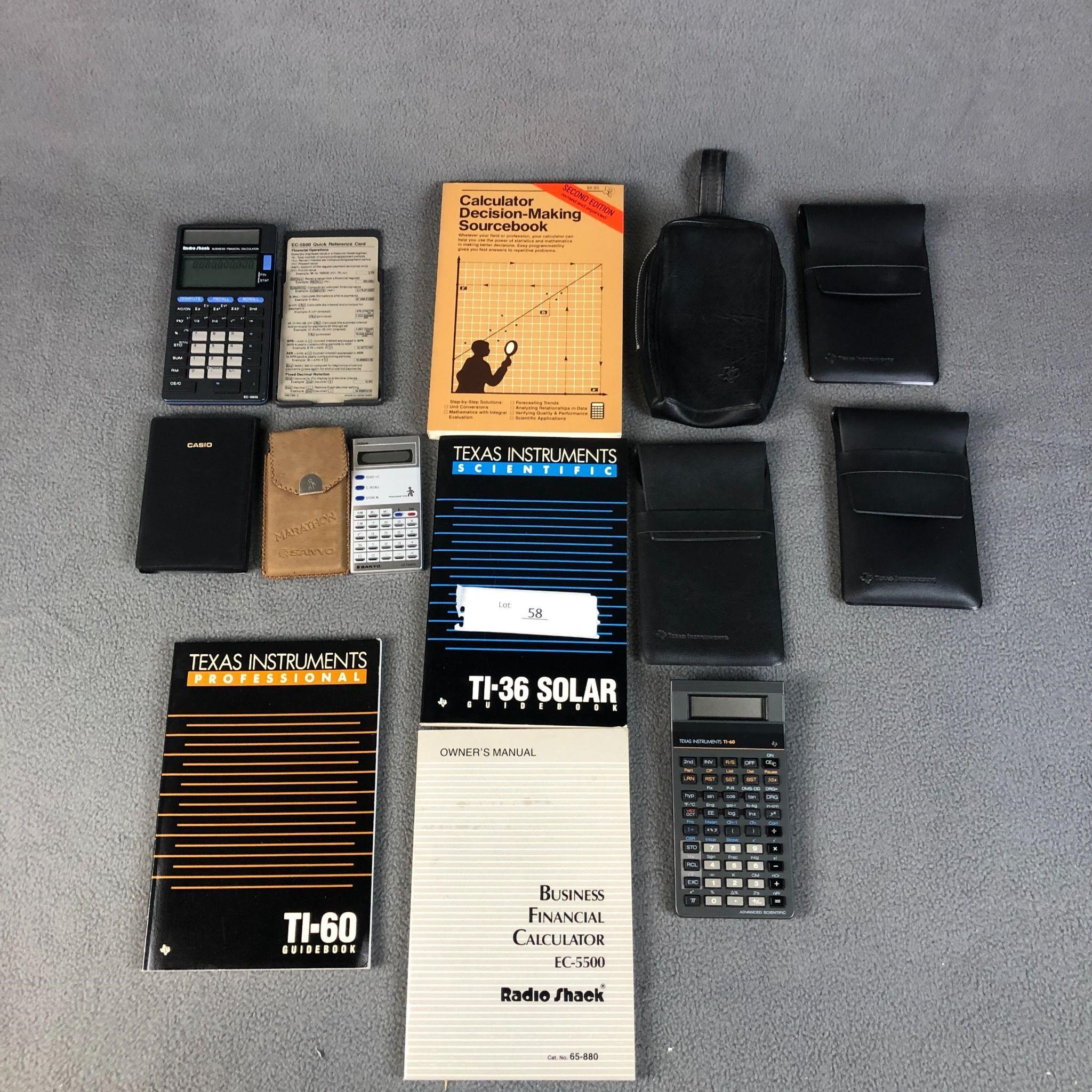Assorted Calculators Manuals and Cases