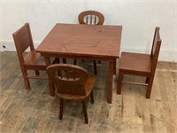 CHILDS TABLE WITH 4 CHAIRS