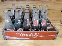 Coca-Cola crate and NC State bottles