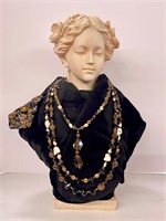 Bust with real gems necklace