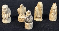 INTERESTING ANTIQUE CARVED IVORY CHESS PIECES