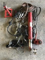 Group of car Jacks and towing equipment