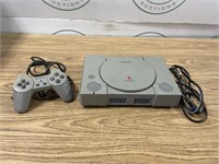 Sony PlayStation w/ a Classic PS1 controller