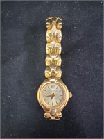 Caravelle By Bulova Woman's Gold Watch
