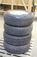 (4) Assorted 235/70R16 Tires On Ford Escape 5 Bolt