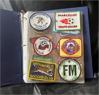 Binder of Assorted Patches Youth Soccer