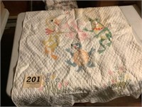 Old baby quilt with some staining