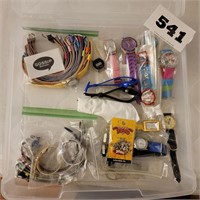 Clear Container Full of Watches and Accessories