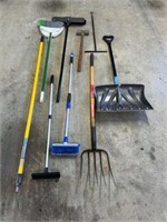 Hand tool grouping- shovel/pitchfork/brooms +