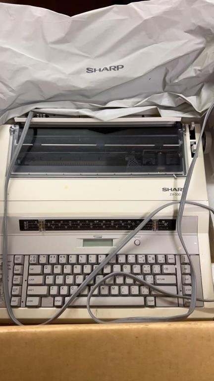 Sharp ZX-330  electric typewriter with cover