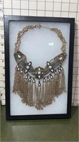 White Buffalo turquoise necklace in frame