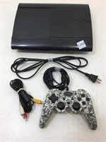 PS3 gaming system with cord and controller.