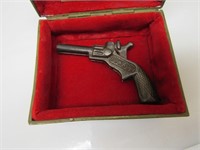 toy cowboy gun & box