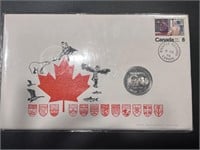 Winnipeg Dollar 100 year Coin in envelope
