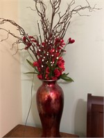 Large glass vase and flowers