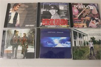 9 Assorted CD's