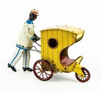 Vintage Strauss Rollo-Chair Tin Windup Toy