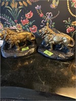 Pair of gold guilded Lion bookends